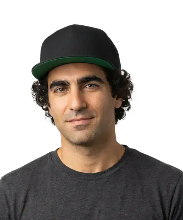 custom flat bill structured hat with embroidered logo worn by team in modern workplace