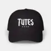 Tutes logo hat in black — four Chicago stars embroidered in white on an unstructured cotton cap