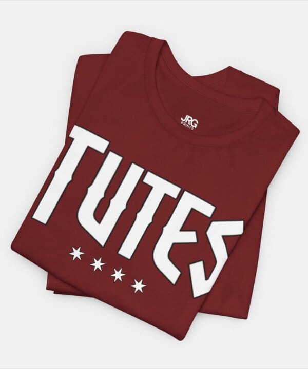 Tutes logo tee — four Chicago stars printed in white on a Bella+Canvas 3001 unisex tee