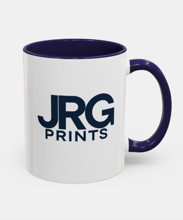 Custom coffee mug with navy accent handle for business branded merchandise