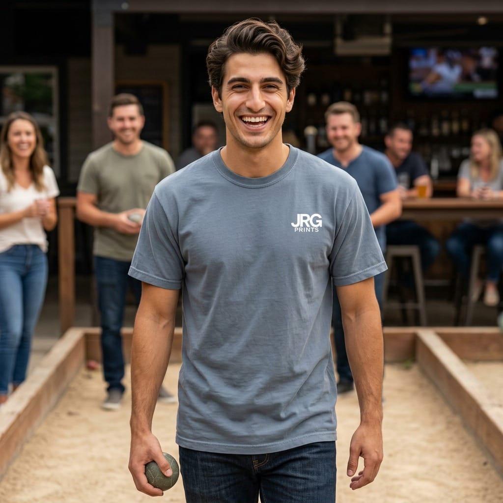 Custom garment-dyed t-shirt worn at a team event, showing relaxed fit