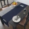 Navy custom table runner shown on a dining table