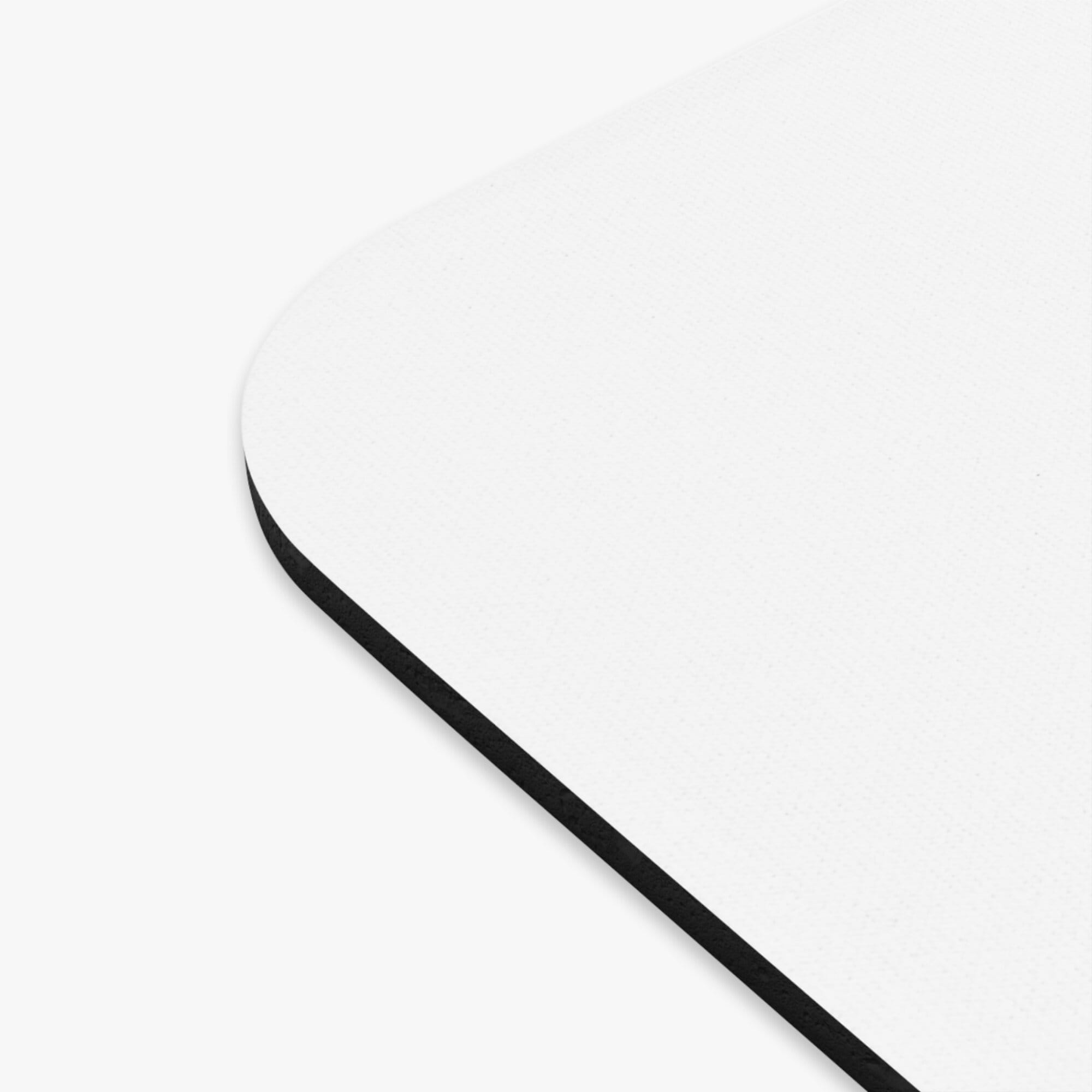 Branded mouse pad shown on a desk